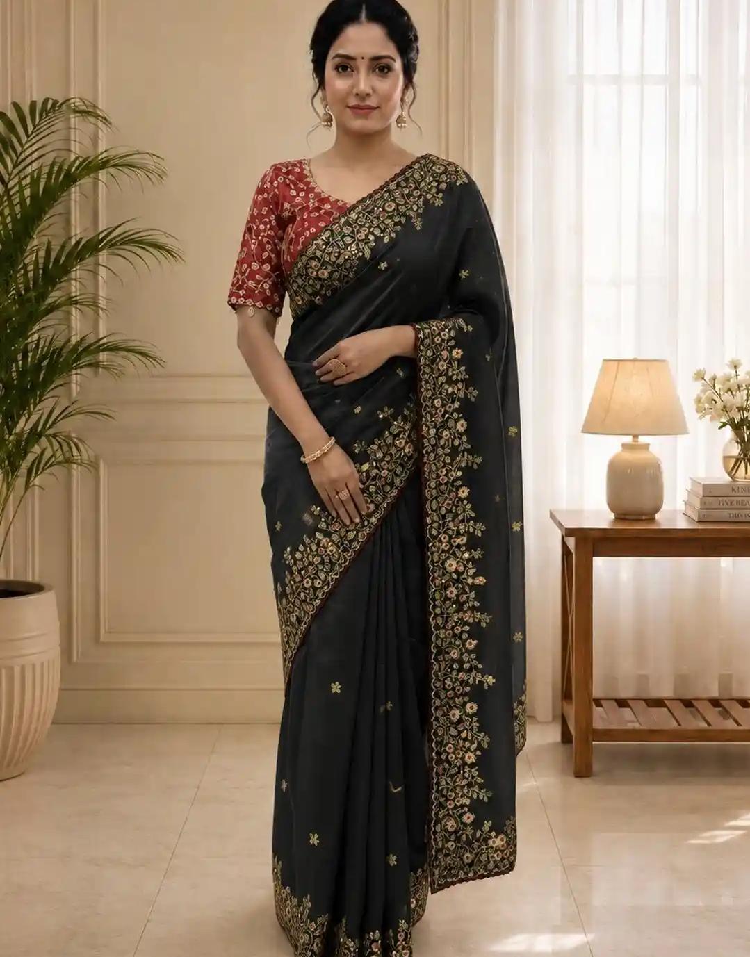 Charcoal Black Raw Silk Saree with Rich Floral Vine Embroidery and Contrast Printed Blouse