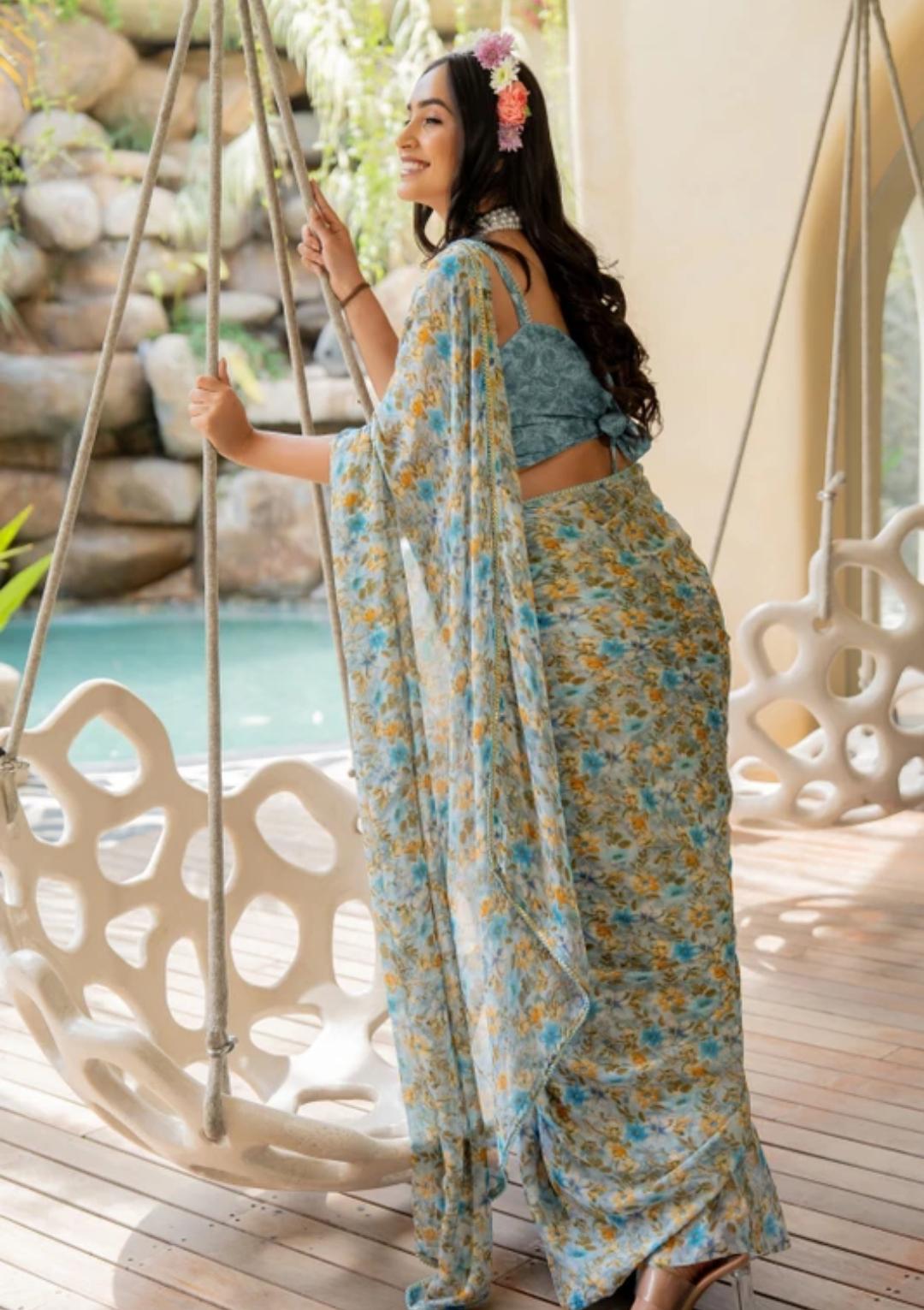 Multicolor Doted White Saari With Sky Blue Blouse