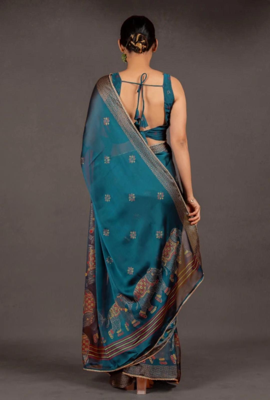 Midnight Blue Organza Saree with Intricate Purple Embroidered Border