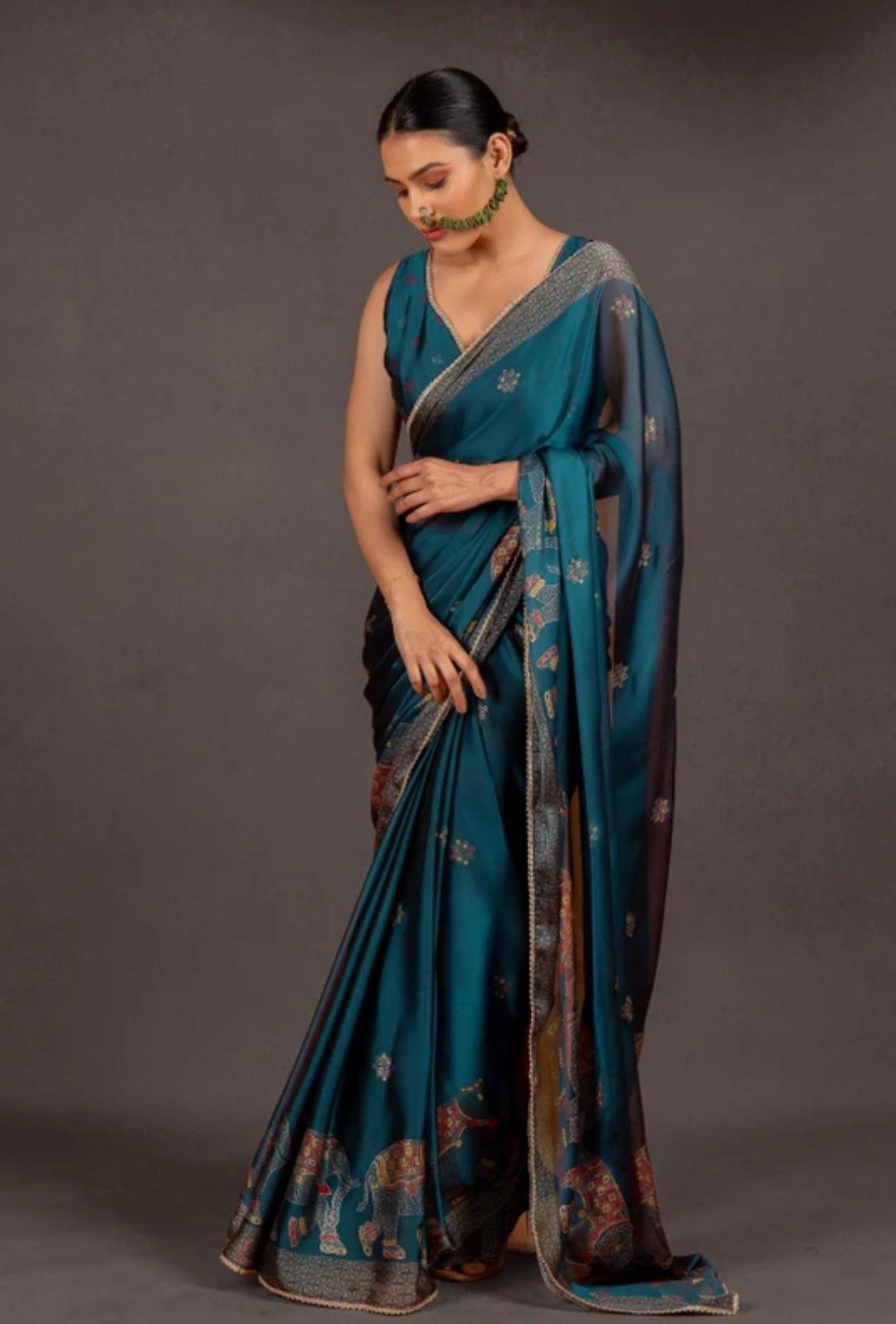 Midnight Blue Organza Saree with Intricate Purple Embroidered Border