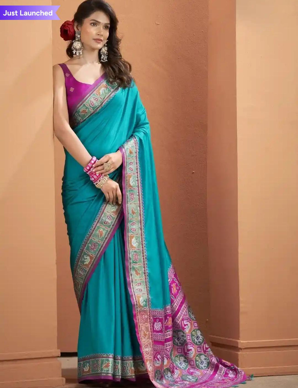 Blue Silk Saari With Purple Embroidery Border And Purple Blouse