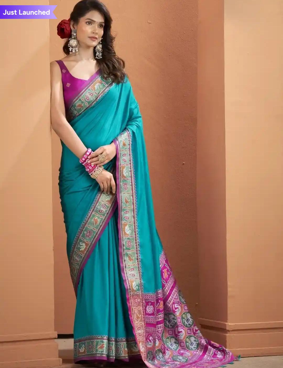 Blue Silk Saari With Purple Embroidery Border And Purple Blouse